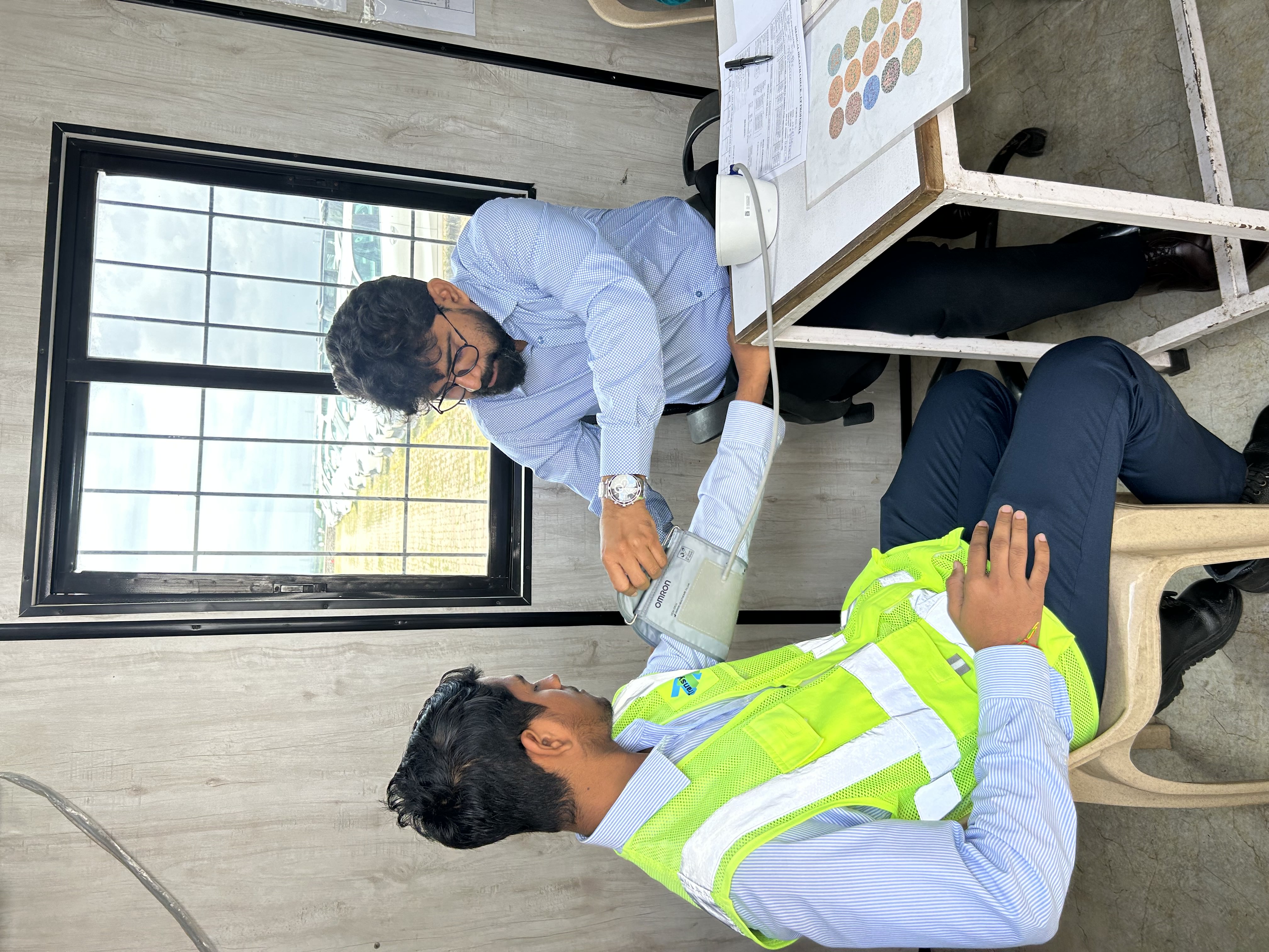Doctor consultation at a health camp.
