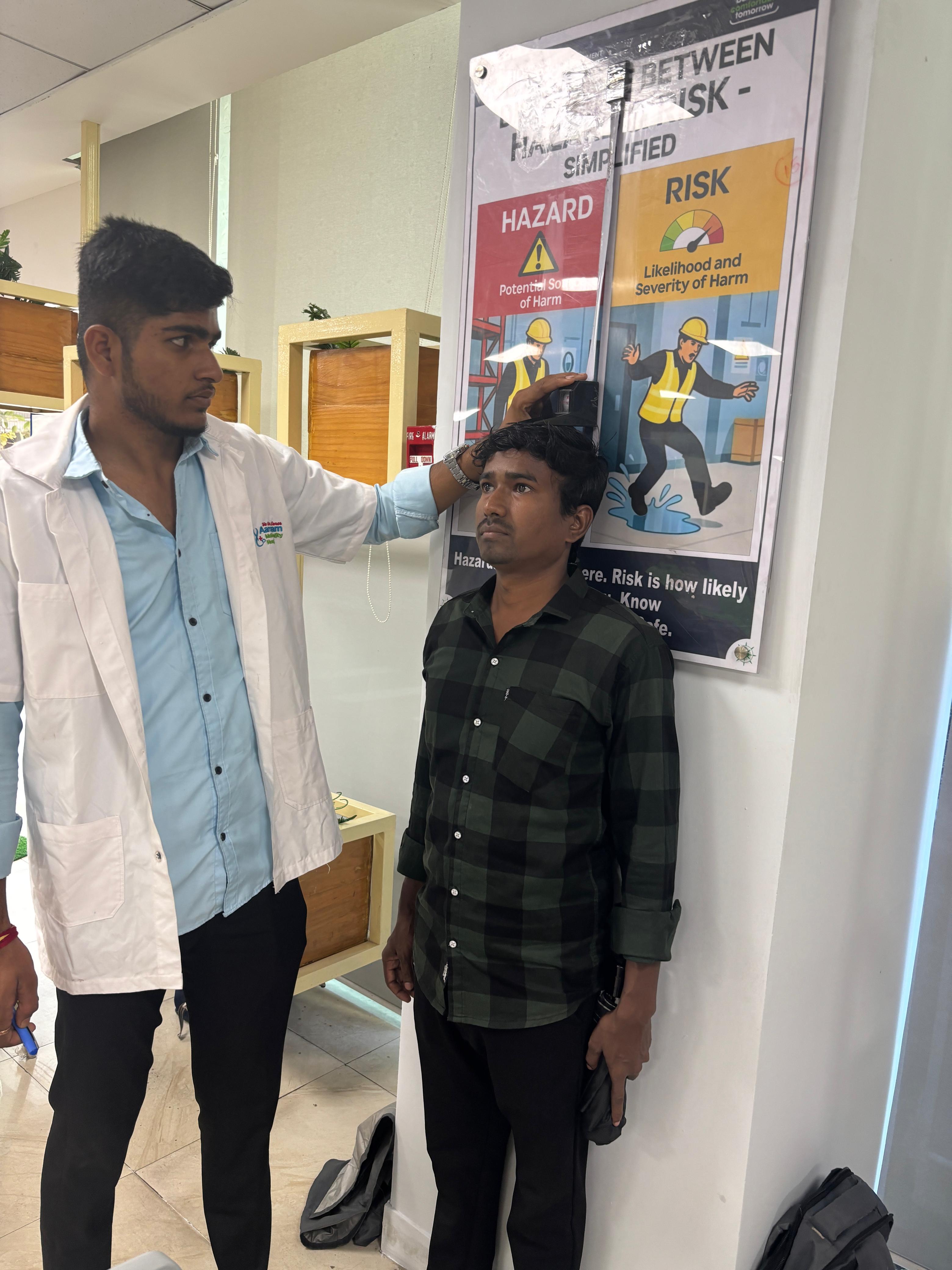 Measuring a patient's height.